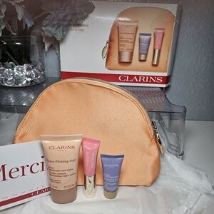 Clarins Skincare Set with Orange Pouch